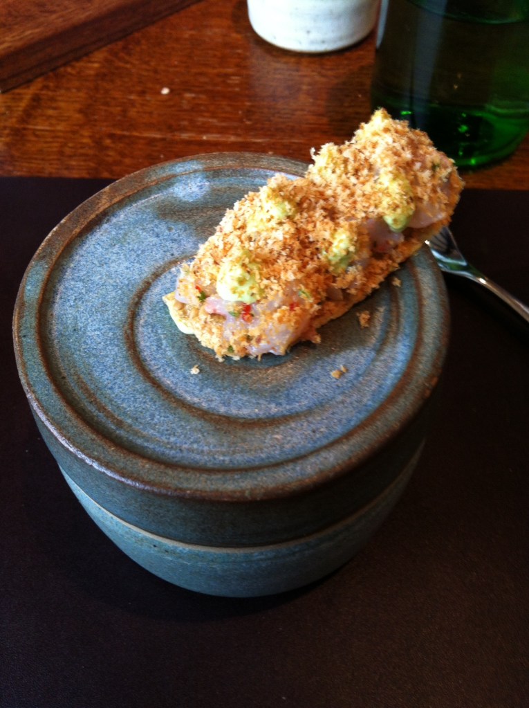 Glazed langoustine, carrot, watercress, raw langoustine, scurvy grass, hazelnuts