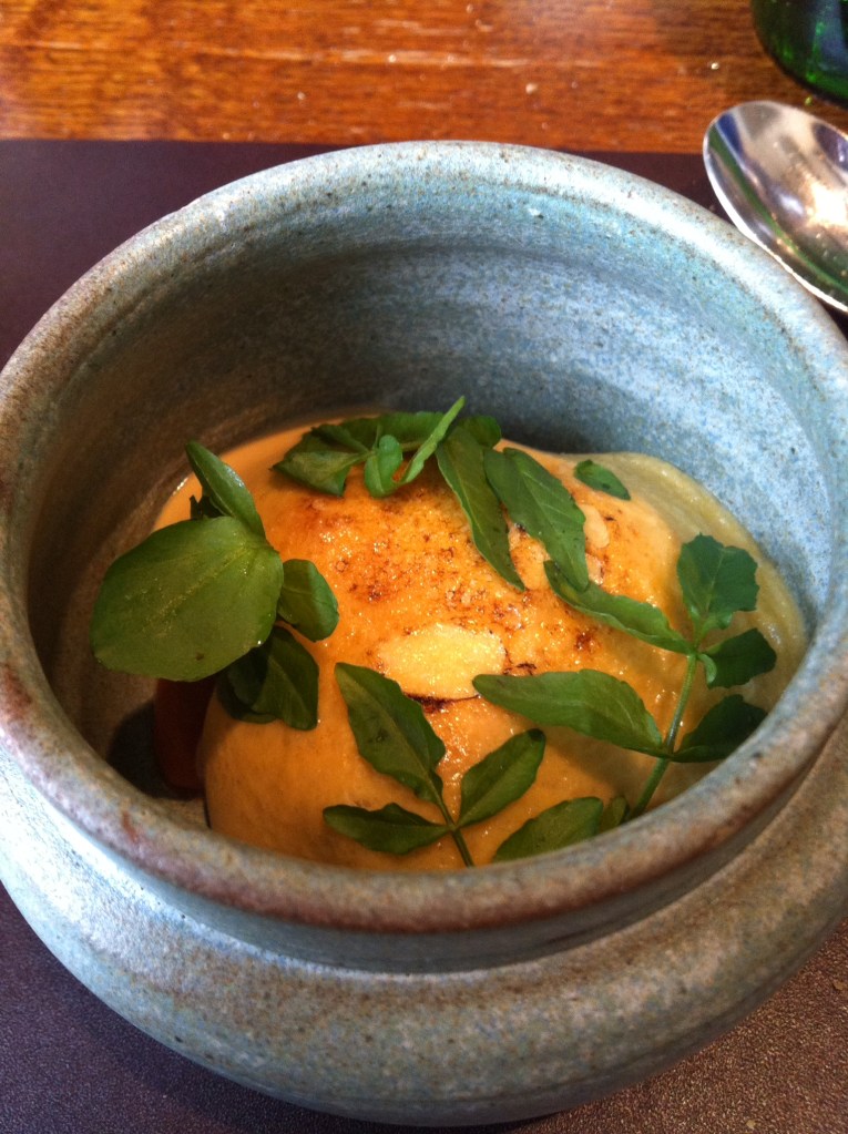 Glazed langoustine, carrot, watercress, raw langoustine, scurvy grass, hazelnuts