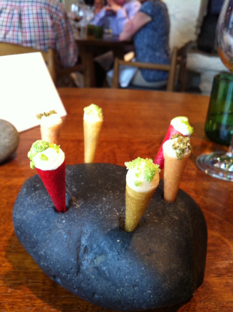 Miniature ice creams of celeriac, sweet cheese, woodruff, douglas fir and apple.